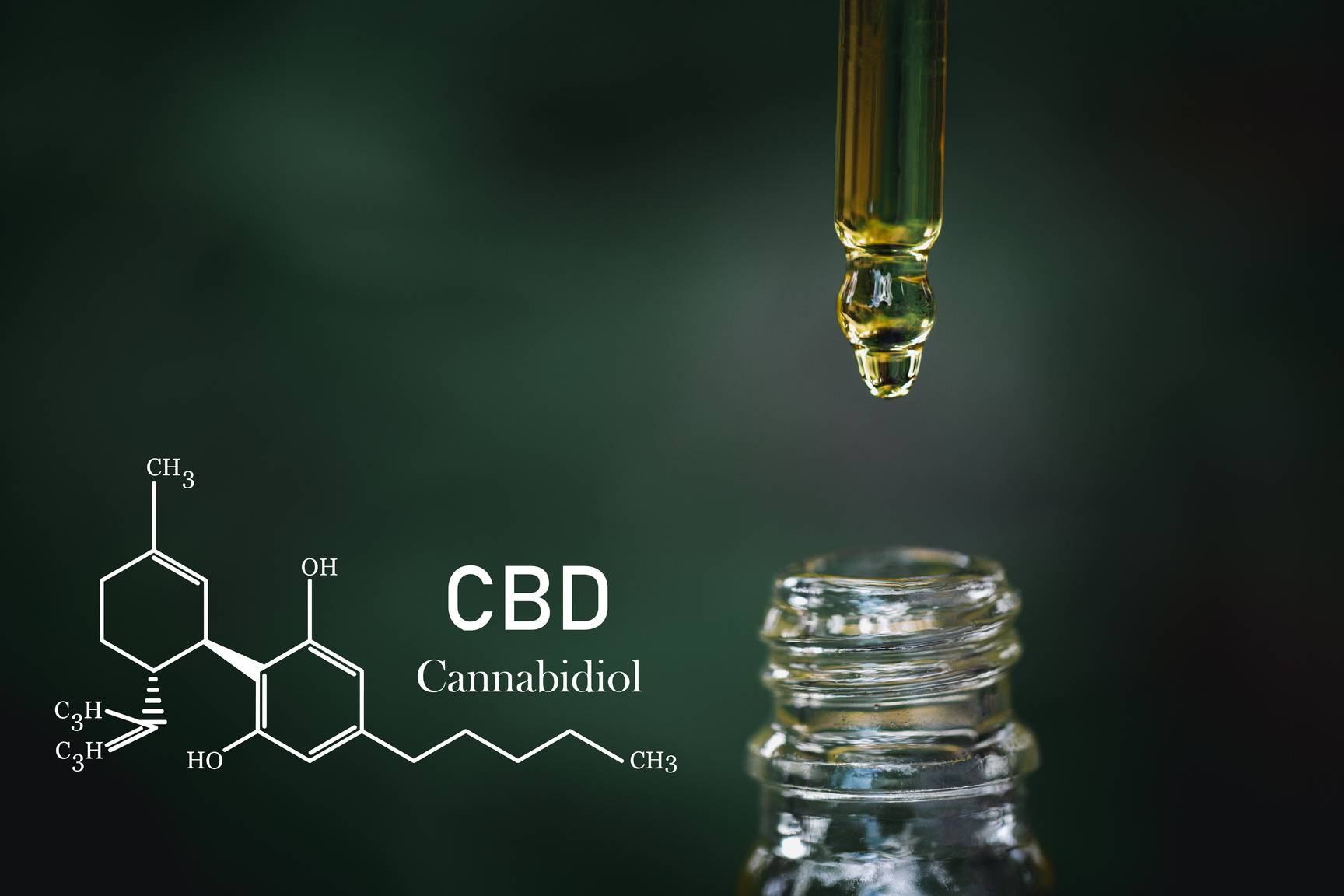 CBD Chemical Formula, droplet dosing a biological and ecological hemp plant herbal pharmaceutical cbd oil from a jar on a green marijuana leaf background.  medical cannabis concept.